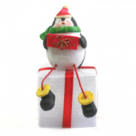 Pingouin sur Paquet de Noël Lumineux - Sujet de Noël
